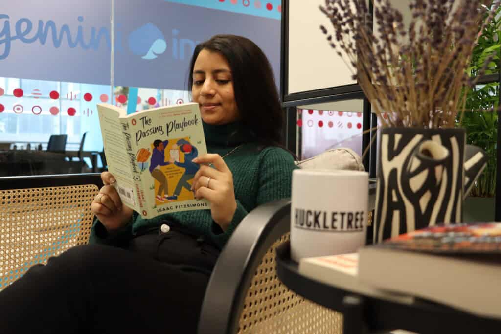 Young women enjoying reading a book.